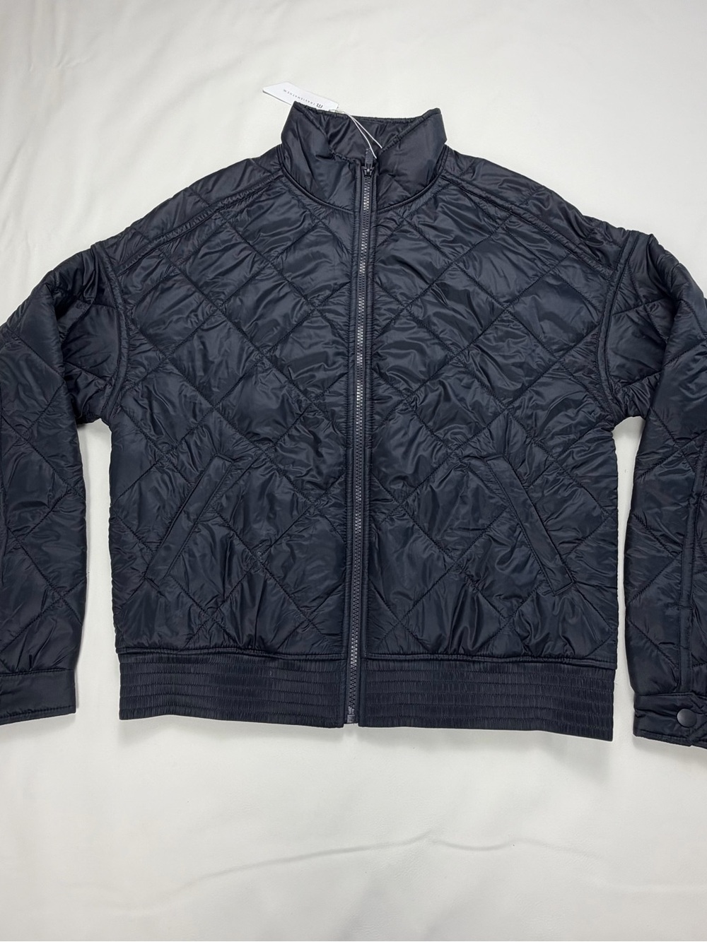 Travis Mathew women’s jacket lights at night quilted obsidian